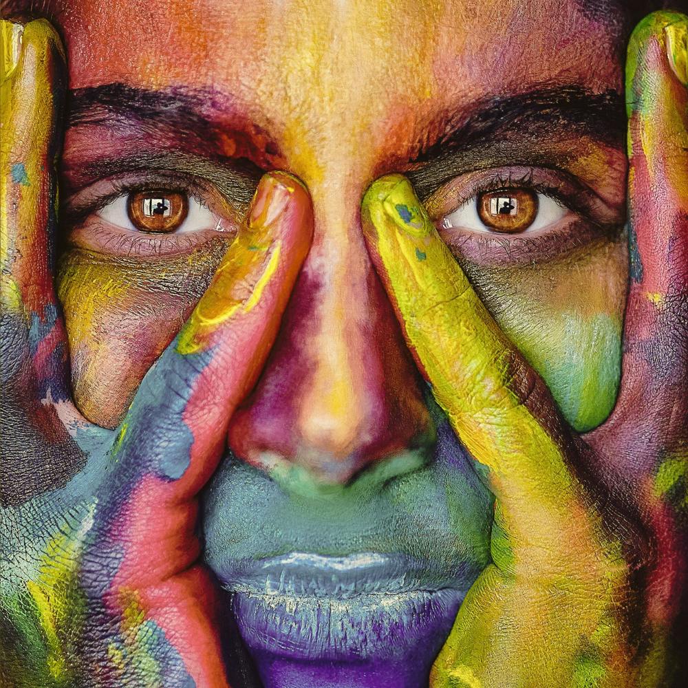 Portrait Of A Woman With Colorful Paint