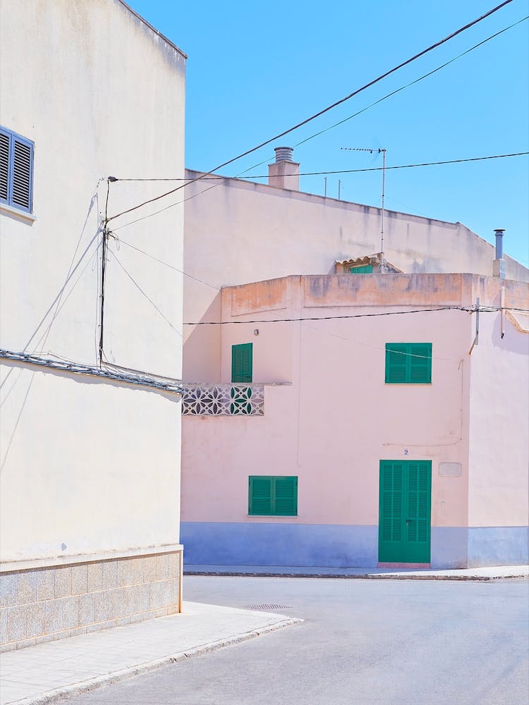 Pink Corner Green Shutters