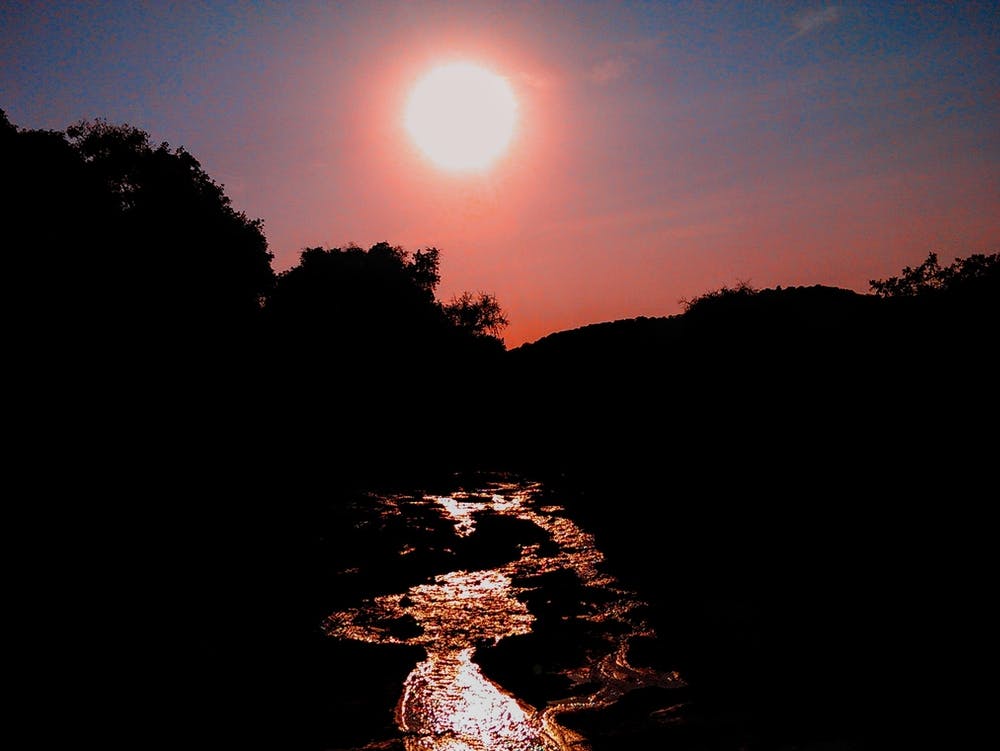 Sunset Over A Stream On The Serengeti, Tanzania (Africa Series)