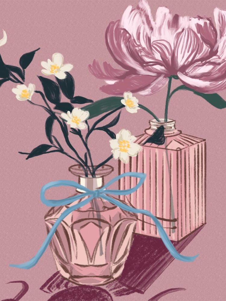 Vintage perfume bottles with flowers