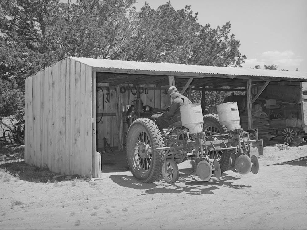 George Hutton With His Tractor,He Is One Of The Few Farmers In This Section Who Farms With A Tractor,This Year He Planted