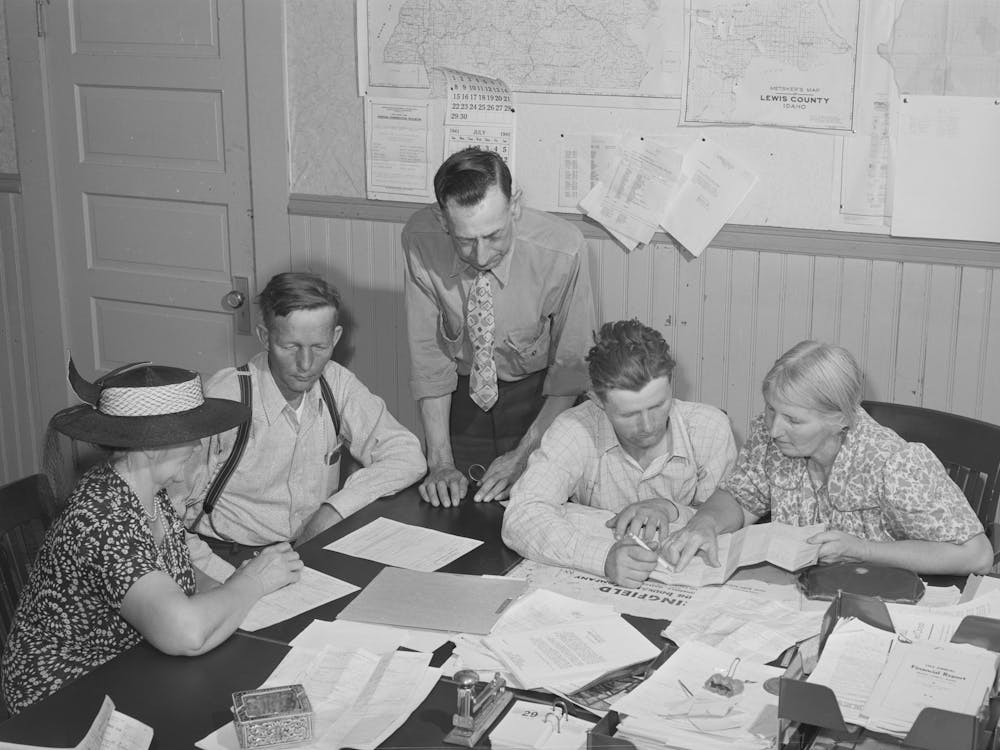 Fsa (Farm Security Administration) Clients Making Plans For Farms In County Supervisor S Office, Grangeville, Idaho