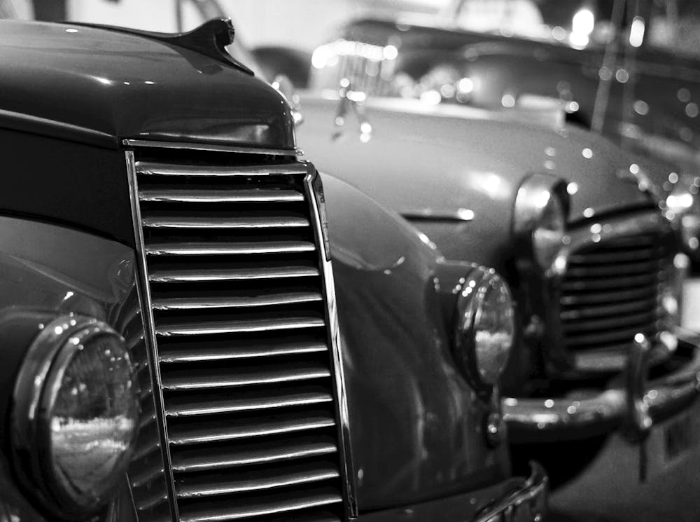 Black And White Photograph Of Vintage Cars