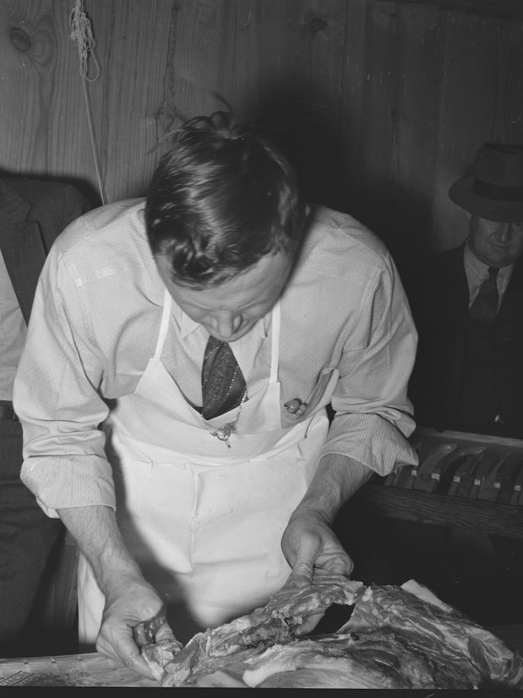 Untitled Photo, Possibly Related To Fsa (Farm Security Administration) Supervisor Making Sausage During A