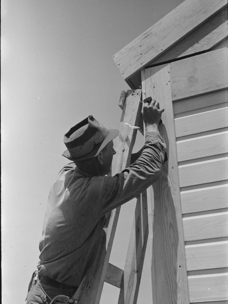 Untitled Photo, Possibly Related To Southeast Missouri Farms Project, Finishing Off Corner Board Of One Of