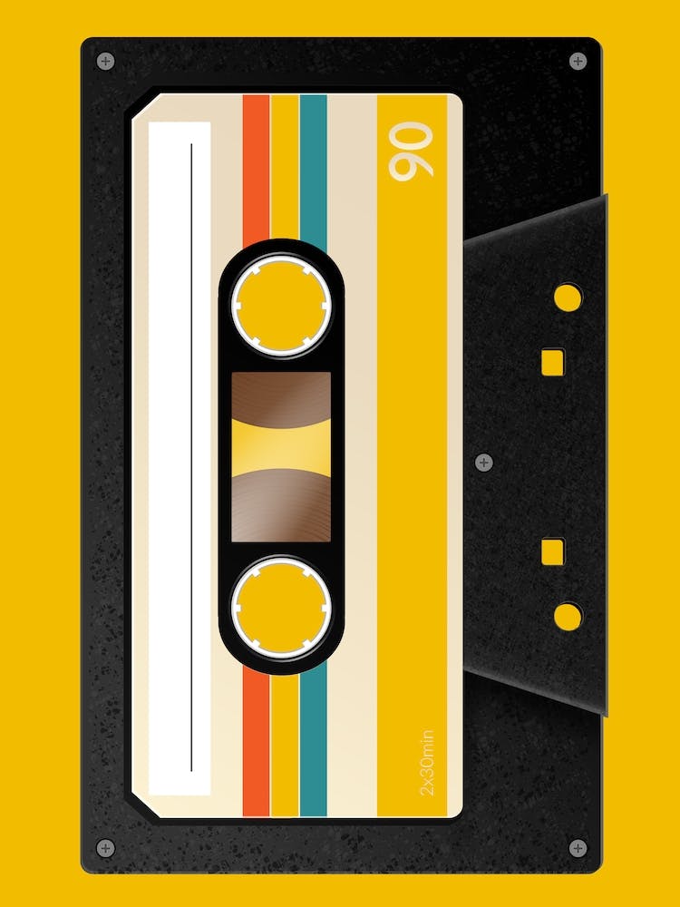 Cassette Tape On A Yellow Background