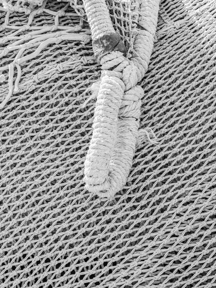 fishing net maritime fish-net pattern texture black and white close-up