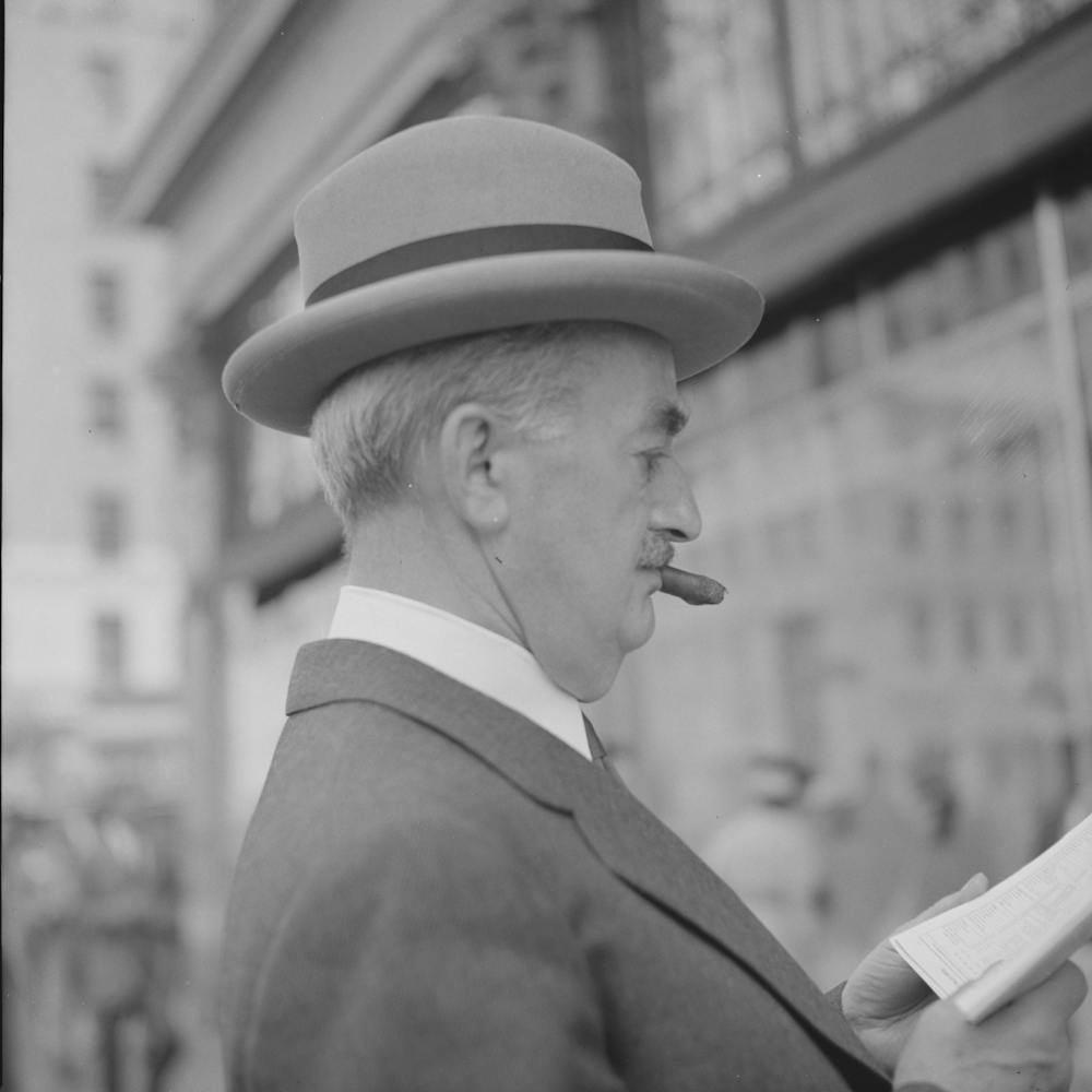 Los Angeles, California, Man Reading Newspaper On Street Corner By Russell Lee