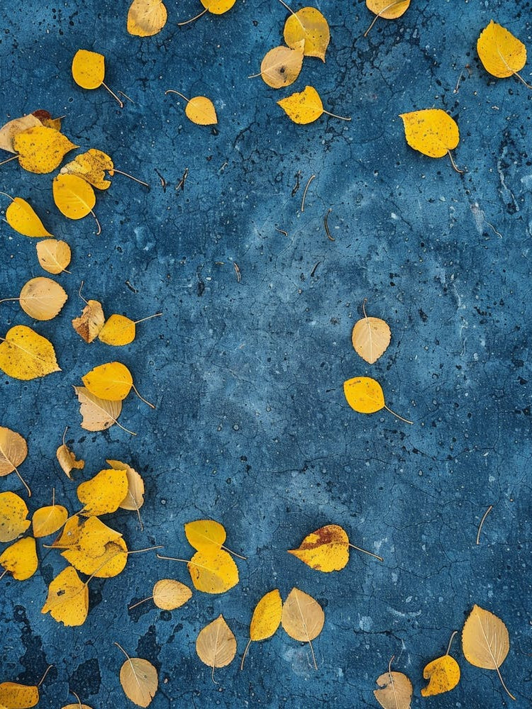 Autumn Leaves On A Blue Background