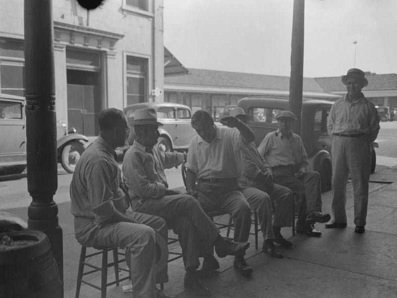 Group Of Italians Talking, Decatur Street, New Orleans, Louisiana By Russell Lee