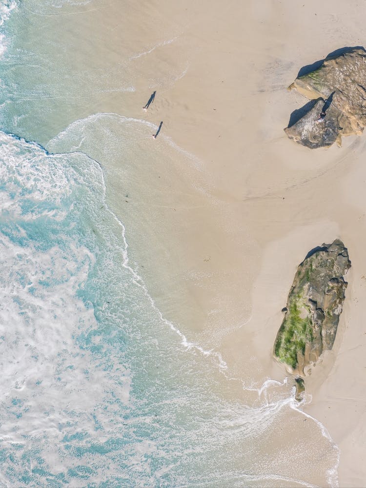 Kids Playing On Beach