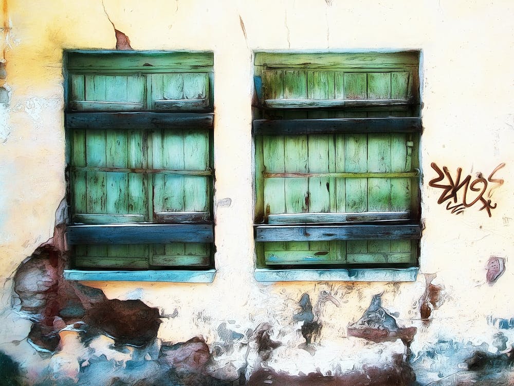 Two Green Shuttered Windows