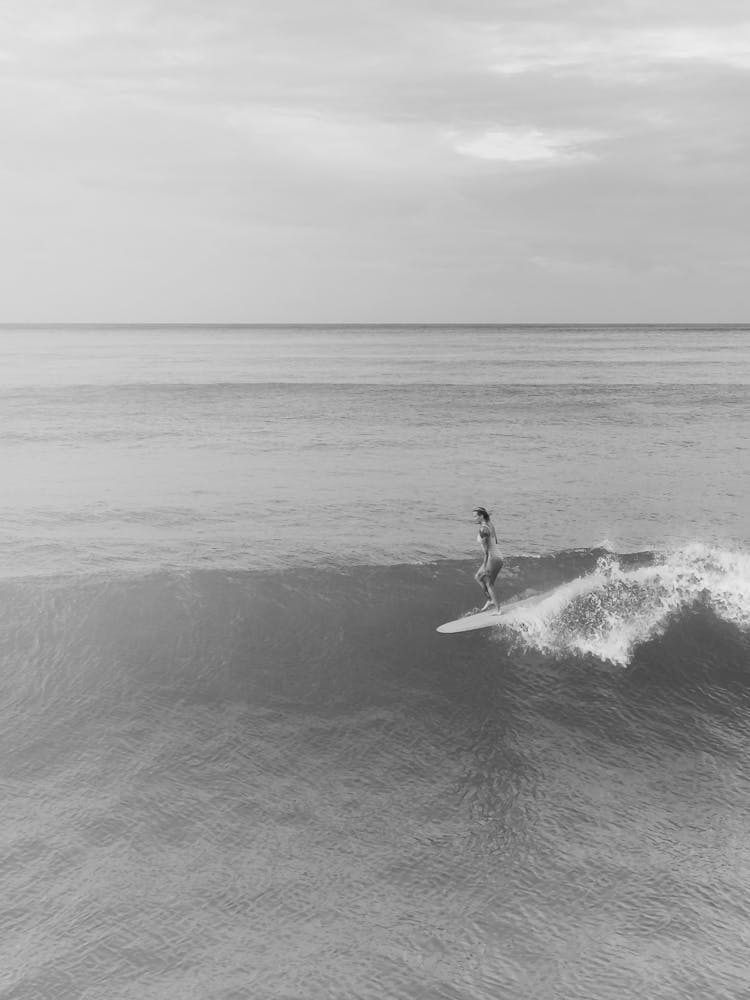 Surfer Riding A Wave