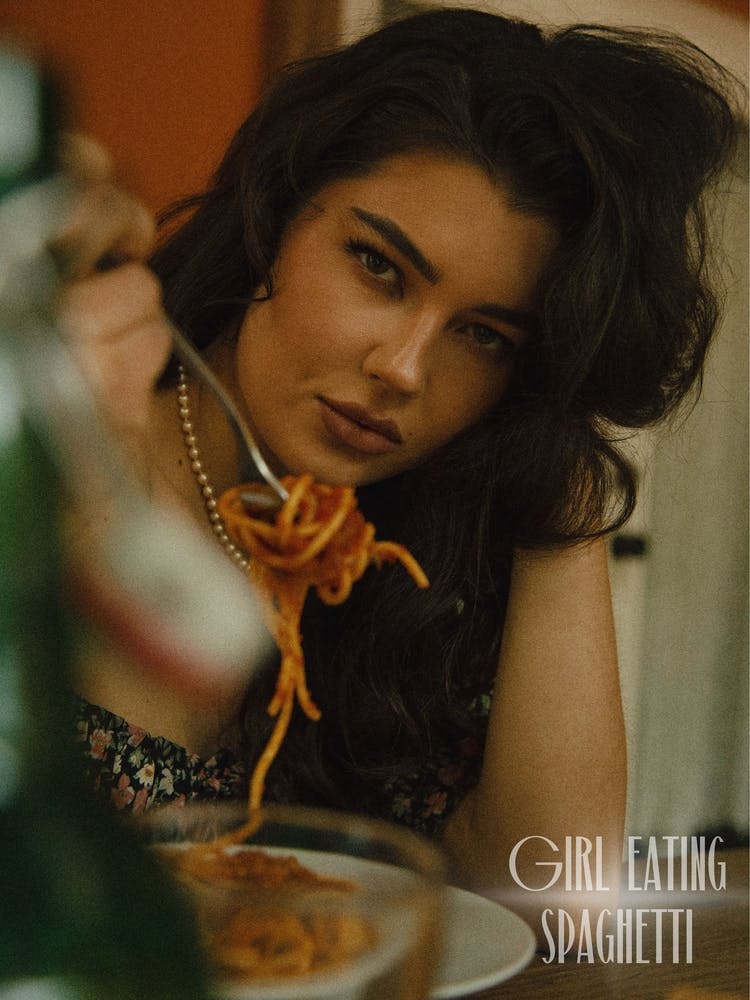 Girl eating Spahetti