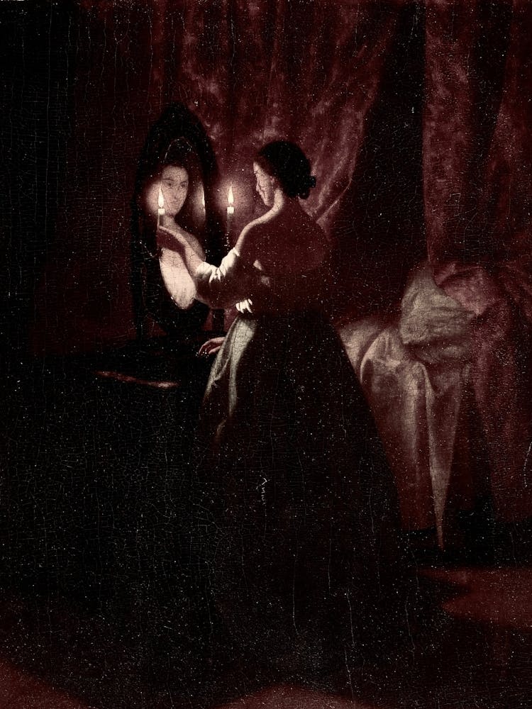 Woman Looking In The Mirror