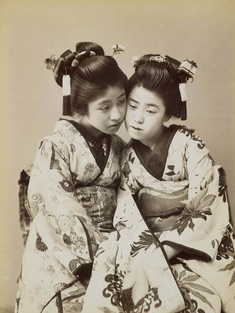 Two Girls Wearing Flowerd Kimonos