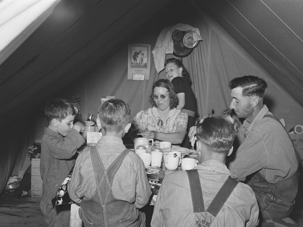 Farm Worker S Family Eating Dinner In The Tent In Which They Live At The Fsa (Farm Security Administration) Migratory Labor