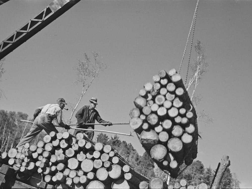 Loaders Pushing Logs Into Place While Loading Car, Lumbercamp Near Effie, Minnesota By Russell Lee