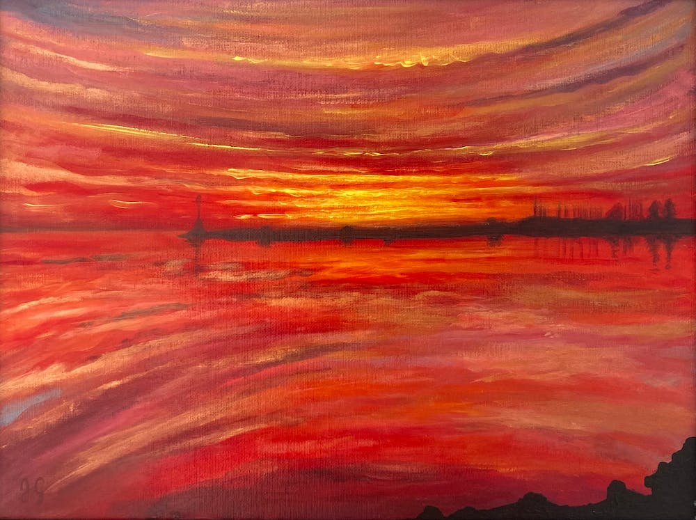 Sunset Over The Water