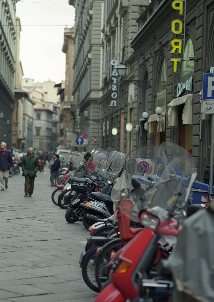Scooters Parked In The Street Florence Italy