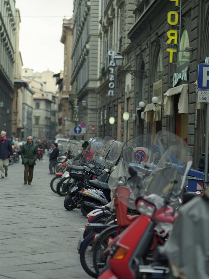 Scooters Parked In The Street Florence Italy