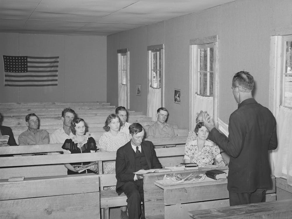 Mr Whinery, Homesteader And Licensed Preacher, Reading The Sunday School Lesson In The Farm Bureau Building