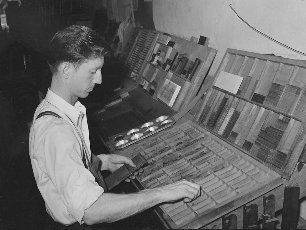 Setting Type By Hand, Newspaper Office, San Augustine, Texas By Russell Lee