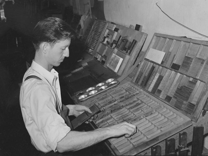 Setting Type By Hand, Newspaper Office, San Augustine, Texas By Russell Lee