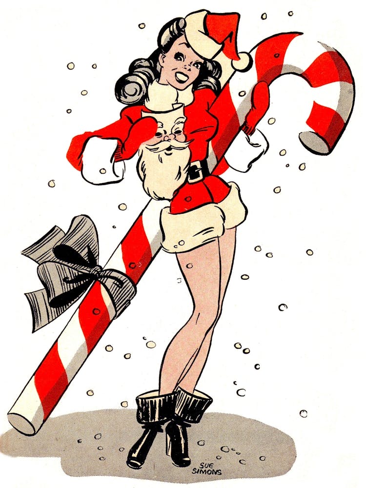 Pinup Girl In Santa Costume And A Big Candy Stick