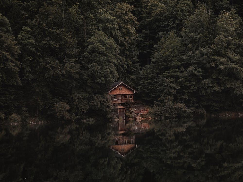 Cabin Reflection On Lake