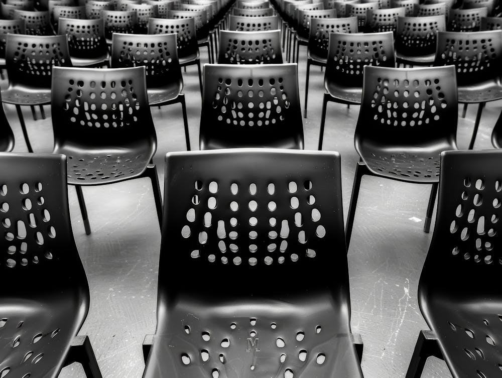 Black And White Image Of Empty Chairs 1