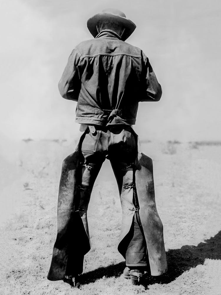 Cowboy In Chaps and Cowboy Boots, Vintage Western Black and White Old Photo