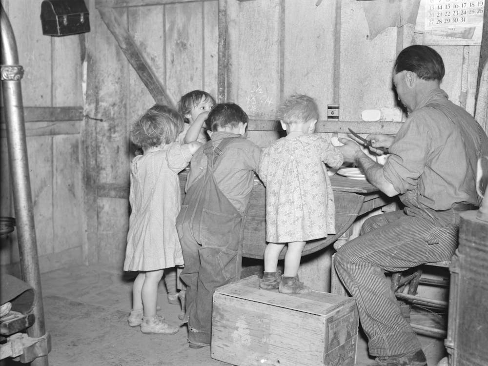 Christmas Dinner In Home Of Earl Pauley, Near Smithfield, Iowa, Dinner Consisted Of Potatoes, Cabbage And Pie By Russ
