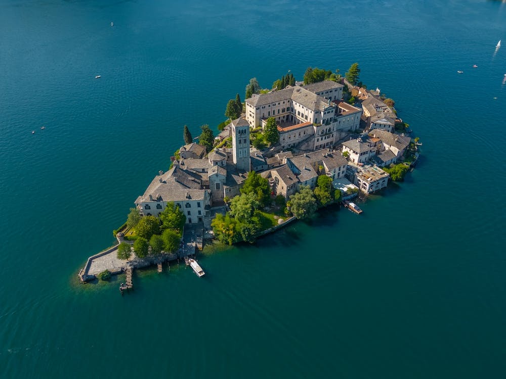 Drone photography of Isola San Giulio (St Julius Island) in Lake Orta, Piedmont, Italy