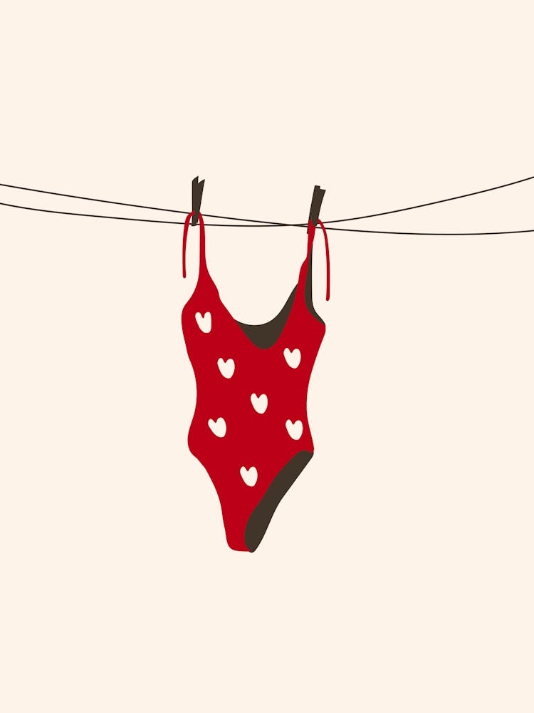 Red Swimsuit Hanging On Clothesline