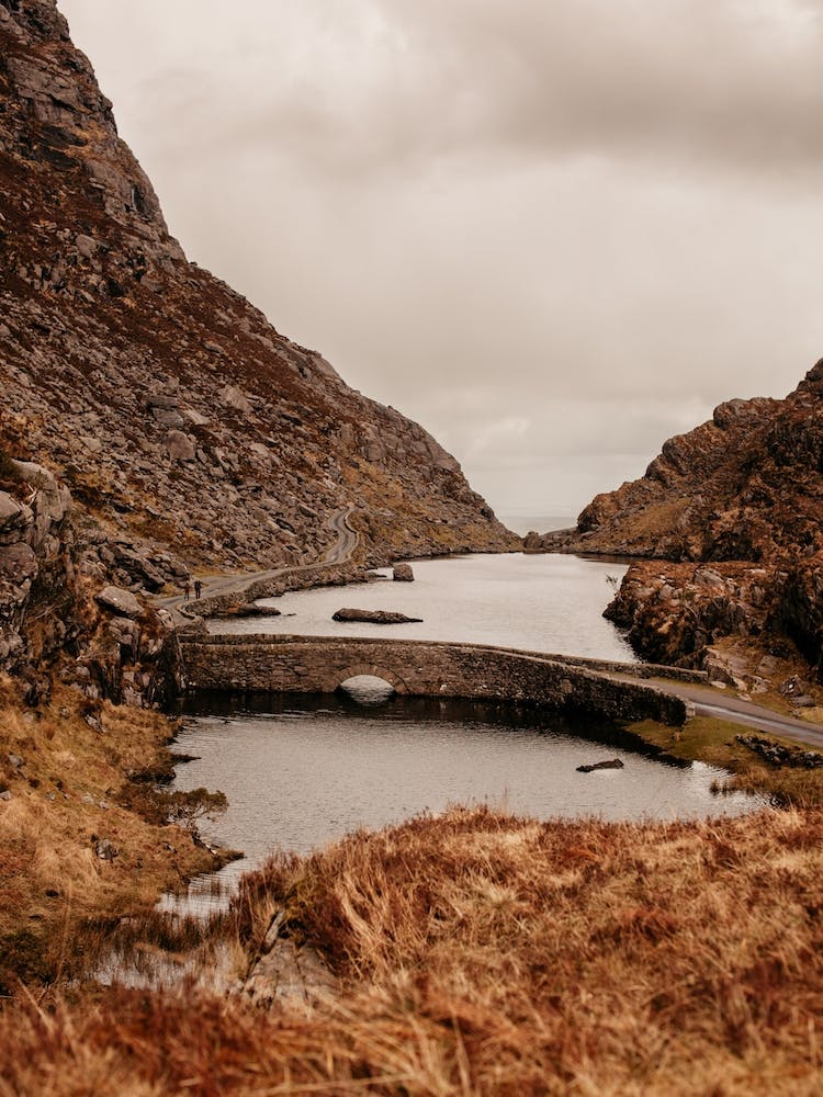 Old Bridge Over Mountain Lake In Ireland