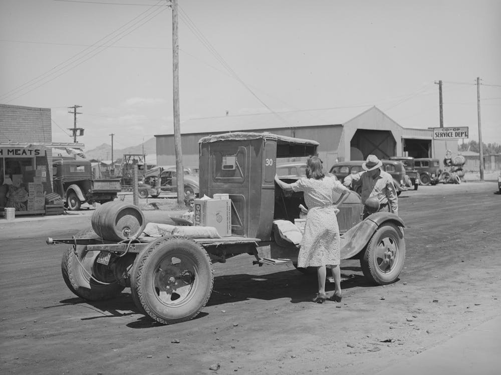 Untitled Photo, Possibly Related To Farmer With His Truck Loaded With Goods Which He Has Bought From The United