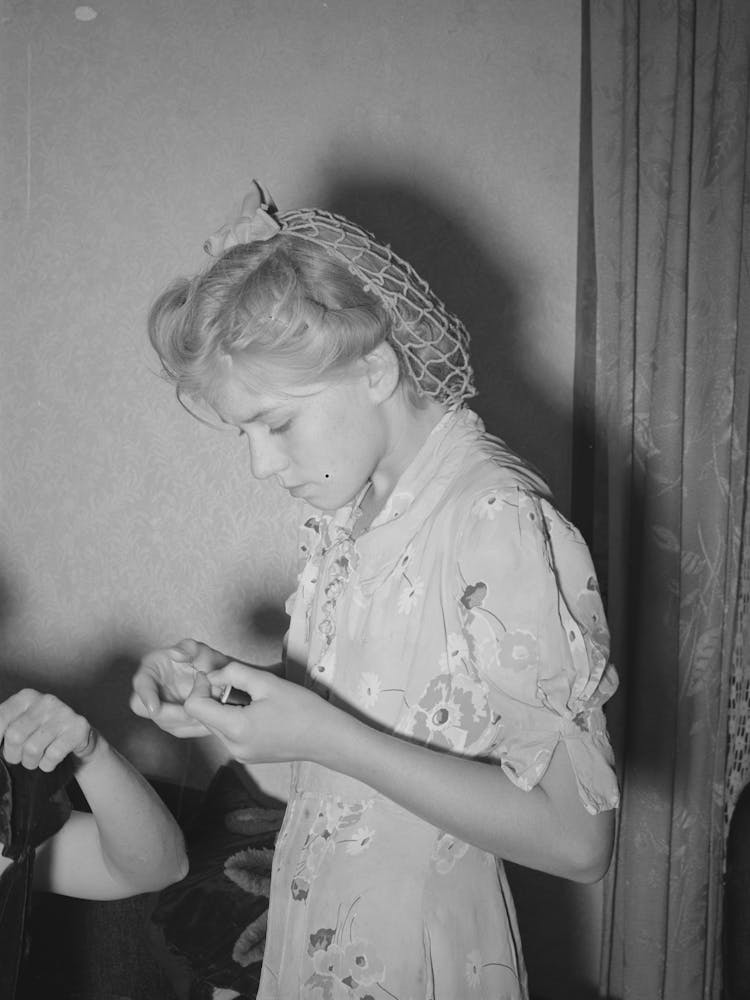 Mormon Girl Threading A Needle, Snowville, Utah By Russell Lee