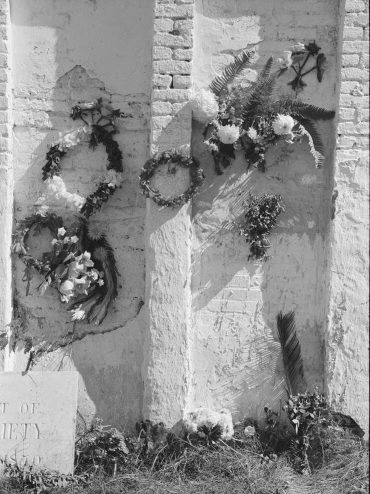 Decorations On Side Of Family Burial Vault In Cemetery At New Roads, Louisiana On All Saints Day By Russell Lee