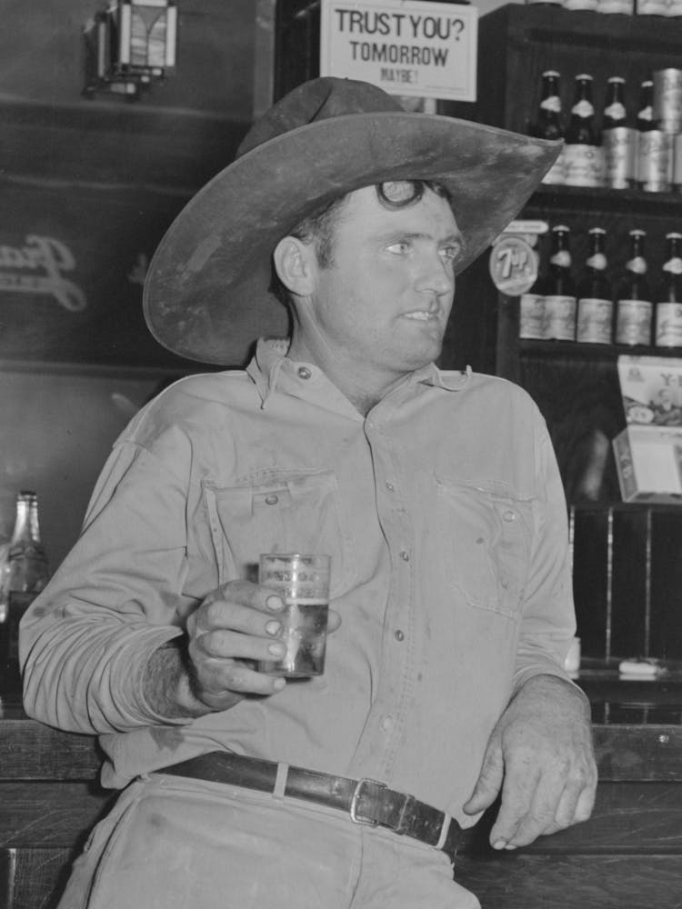 Cowboy Drinking Beer In Beer Parlor, Alpine, Texas By Russell Lee