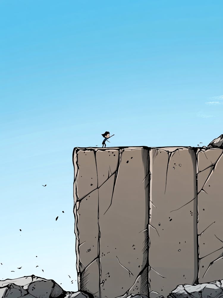 Man Standing On A Cliff