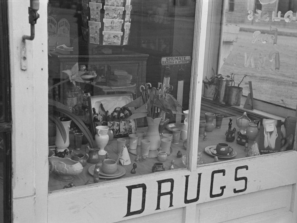 Drugstore Window, Ray, North Dakota By Russell Lee