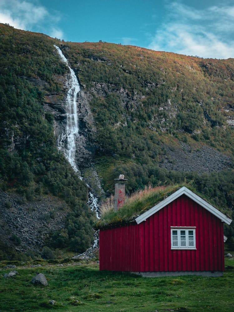 Red House With Waterfall