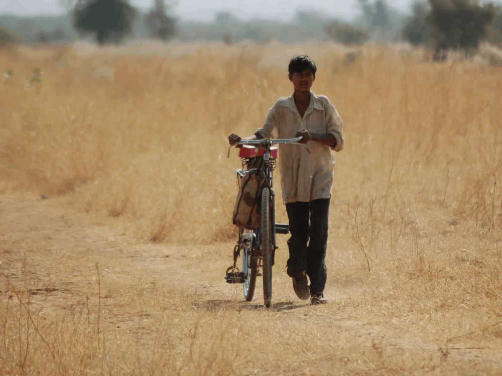 Boy With Bicycle In Rajasthan, India