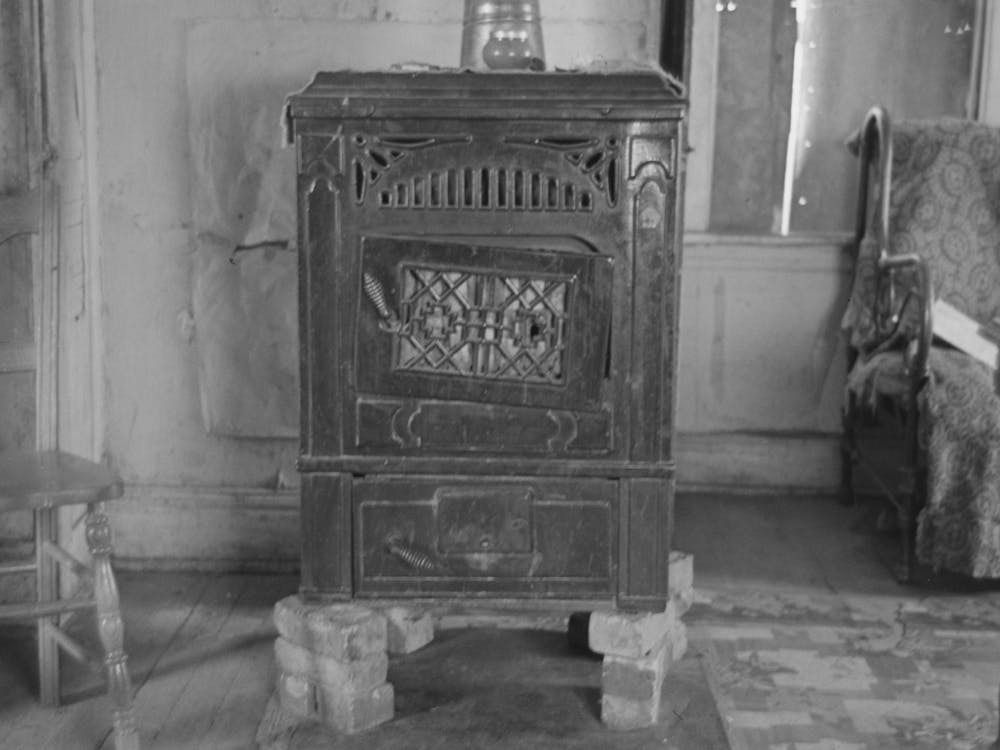 Heater In Home Of William Huravitch, Farmer Near Wheelock, North Dakota By Russell Lee