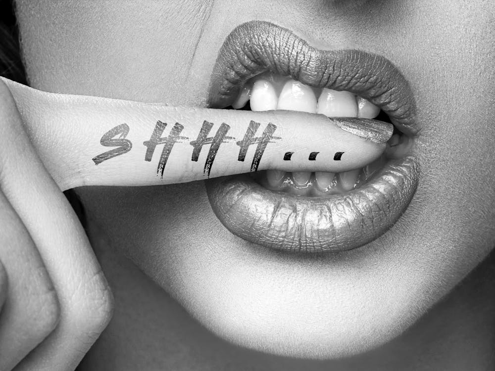 Shhh... Tattooted Woman Biting On Her Finger Black And White Photography Photograph Photographs