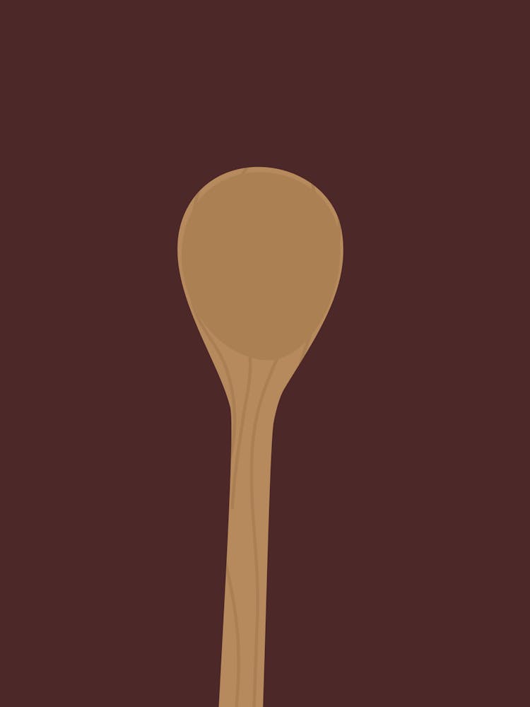 Wooden Spoon On A Brown Background