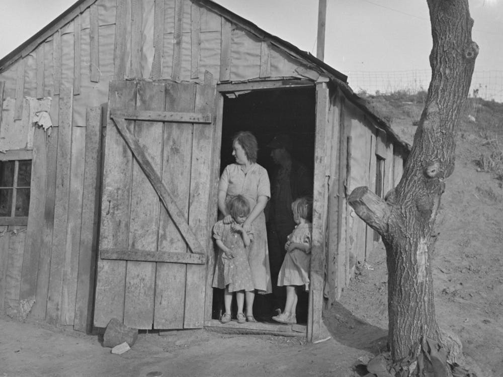 Mrs, Earl Pauley And Some Of Her Children In Doorway Of Farm Home Near Smithland, Iowa, They Are Tenant