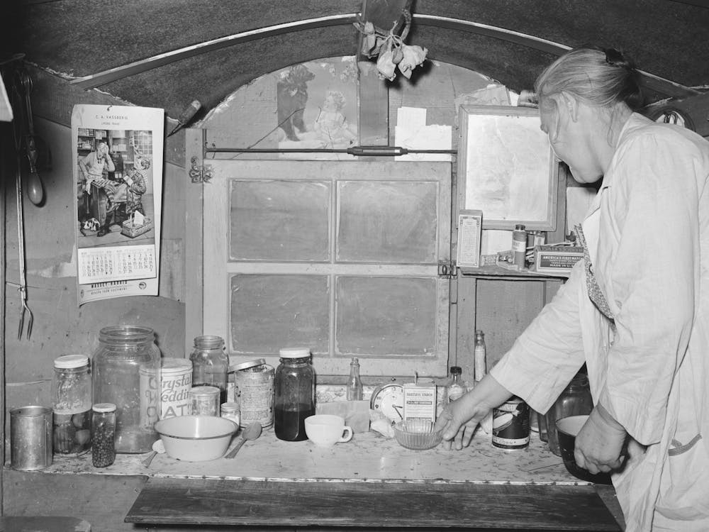 Kitchen Table And One End Of Trailer Belonging To White Migrant Encamped At Sebastian, Texas By Russell Lee