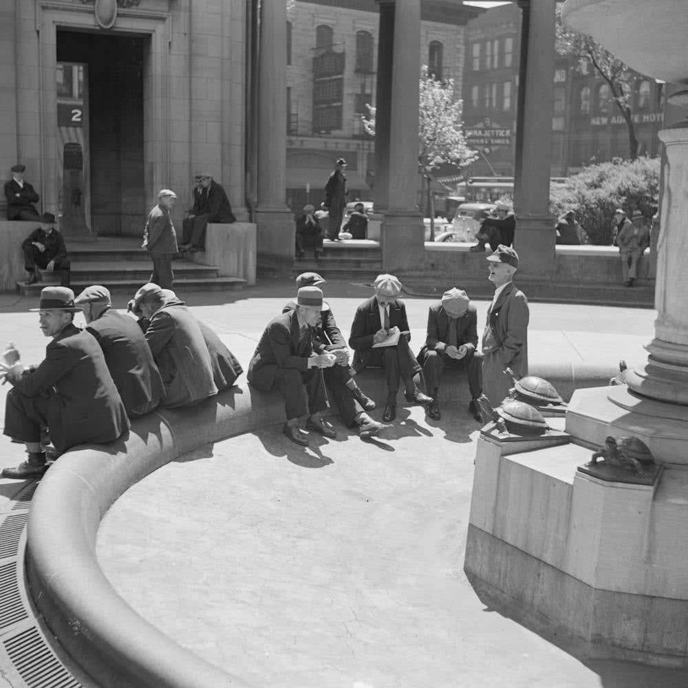 Unemployed Men Sitting In Public Square In The Minneapolis Gateway District, Minnesota By Russell Lee